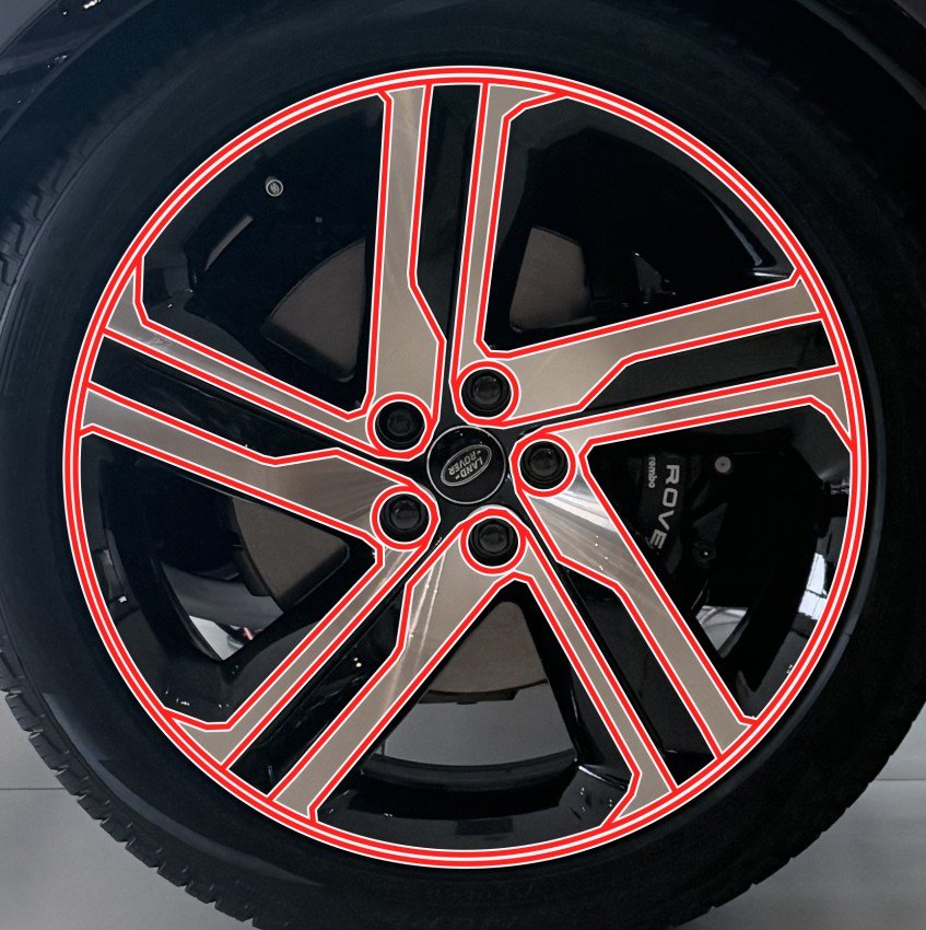 Range Rover wheel with red cut lines traced