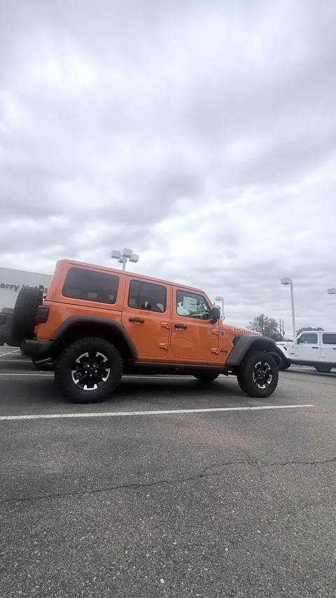 Jeep Wrangler Rubicon: Sunset Orange: Before: stock wheels