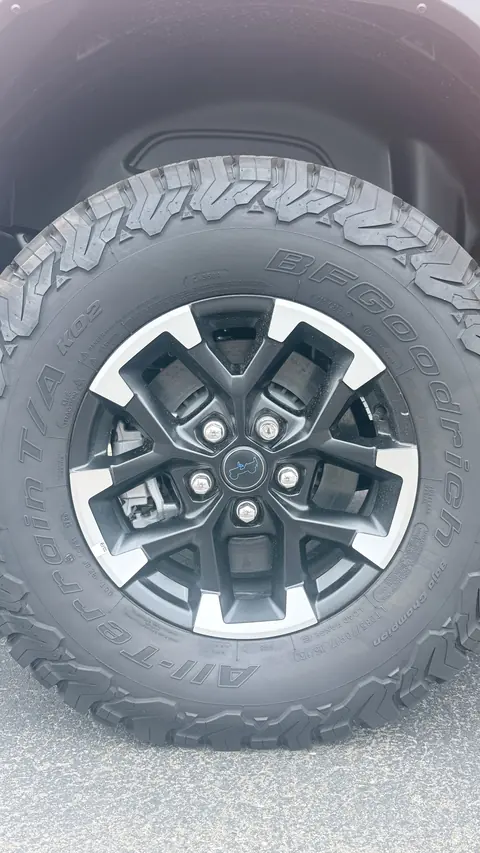 Real photograph of a stock Rubicon wheel before vinyl is applied